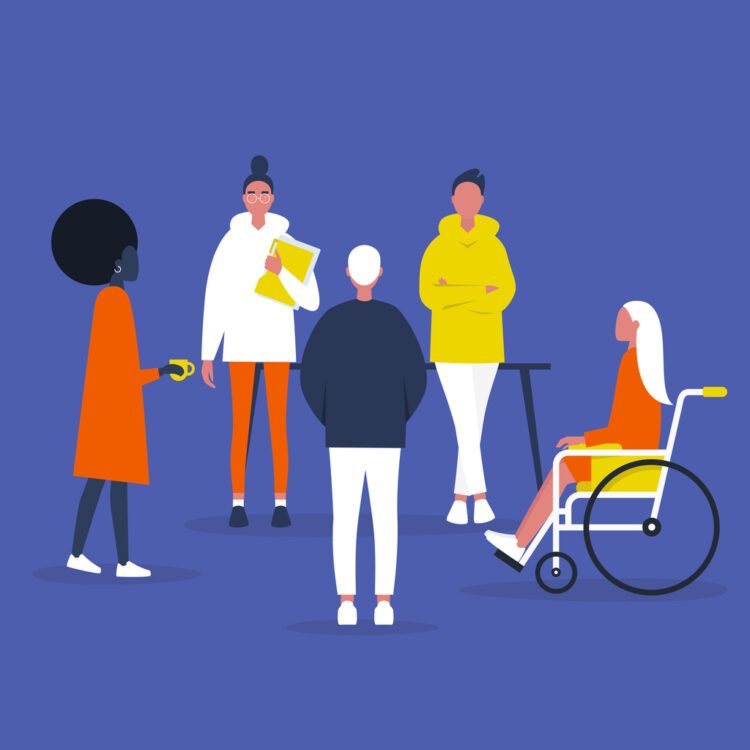 Eine Gruppe von Personen, eine davon stitz im Rollstuhl.